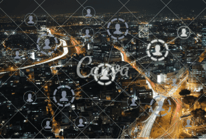 Social network logos on city backdrop, illustrating the integration of digital platforms with city life.